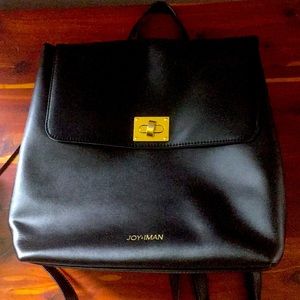 Joy and Iman black leather knapsack style purse